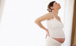 Почему болит поясница на 35 неделе беременности??